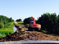 Berming and Trackhoe - Click on Image to enlarge Berming and Trackhoe - Click on Image to enlarge
